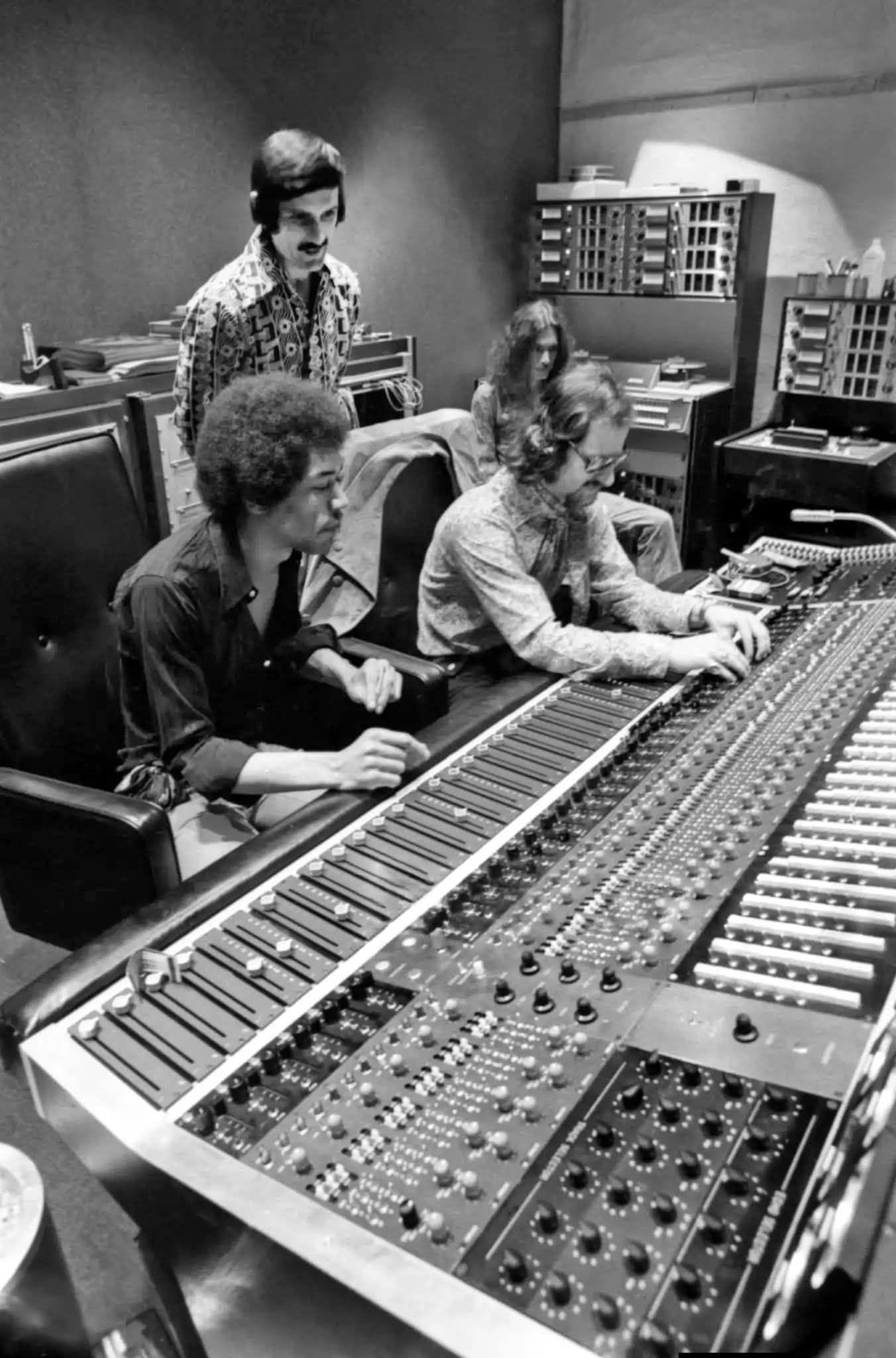 Jimi and Eddie Kramer, with Electric Lady manager Jim Marron observing. No idea who that is in the back. 1970.